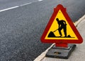 Roadwork sign at the side of a road