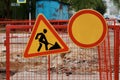 Roadwork signs and prohibited traffic on the guardrail for safe roadworks. Royalty Free Stock Photo