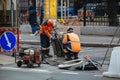 Roadworkers on repair of road surface Royalty Free Stock Photo