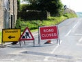 Roadworks with diversion sign
