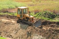 Roadworks, yellow bulldozer work