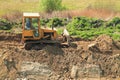 Roadworks, yellow bulldozer work