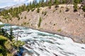 Roaring Rapids Flowing Toward Bow Falls in Banff National Park Royalty Free Stock Photo