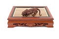 Roaring tiger figurine on chinese wooden table Royalty Free Stock Photo