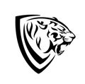 Roaring tiger head and simple heraldic shield black and white vector design Royalty Free Stock Photo