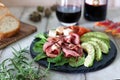 Roast beef and avocado appetizer snacks and red wine Royalty Free Stock Photo