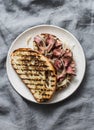 Roast beef homemade grilled bread sandwich on a grey background, top view Royalty Free Stock Photo