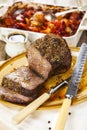 Roast beef joint with roast vegetables Royalty Free Stock Photo