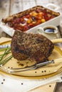 Roast beef joint with roast vegetables Royalty Free Stock Photo