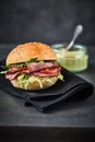 Roast beef pastrami sandwich with mustard in background Royalty Free Stock Photo