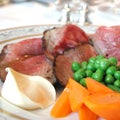 Roast beef, peas, carrot and potatoes Royalty Free Stock Photo