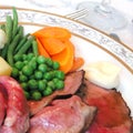 Roast beef, peas, carrot and potatoes Royalty Free Stock Photo