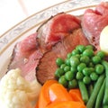 Roast beef, peas, carrot and potatoes Royalty Free Stock Photo