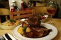 Roast beef served with cauliflower cheese, a dish of mixed fresh vegetables & gravy Royalty Free Stock Photo