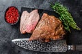 Roast beef tri tip steak bbq. Black background. Top view Royalty Free Stock Photo