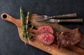 Roast beef on a wooden board Royalty Free Stock Photo