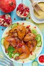 Roast chicken with crispy skin on healthy couscous salad Royalty Free Stock Photo