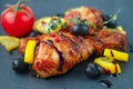 Roast chicken with lemon, olives, tomato and thyme Royalty Free Stock Photo