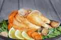 Roast chicken with vegetables in a pan Royalty Free Stock Photo