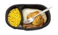 Roast chicken with vegetables TV dinner and fork Royalty Free Stock Photo