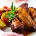 Roast chicken wings with rosemary Royalty Free Stock Photo