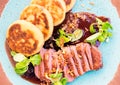 Roast duck with potato pancakes and plum sauce Royalty Free Stock Photo