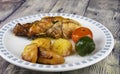 Roast guinea fowl with potatoes and Cremona mustard