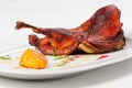 Roast half of duck with caramelized lemon Royalty Free Stock Photo