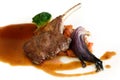Roast lamb chops with gravy on white background Royalty Free Stock Photo
