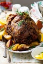 Roast lamb leg with Vegetables.style rustic. Royalty Free Stock Photo