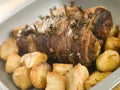 Roast Leg of Lamb Studded with Rosemary and Garlic Royalty Free Stock Photo