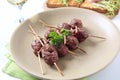 Roast meat balls on skewers Royalty Free Stock Photo