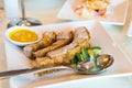 Roast pork belly with mustard sauce Royalty Free Stock Photo