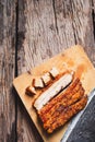 Roast Pork Belly on wooden Royalty Free Stock Photo