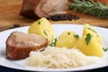 Roast pork with boiled potatoes and sauerkraut Royalty Free Stock Photo