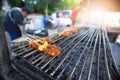 Roast pork on charcoal grill.  Street food concept Royalty Free Stock Photo