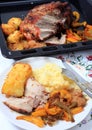 Roast pork dinner with joint Royalty Free Stock Photo