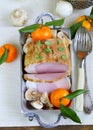 Roast pork with mushrooms and tangerines Royalty Free Stock Photo