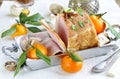 Roast pork with mushrooms and tangerines Royalty Free Stock Photo