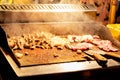 Roast pork on the stove, prepared by the seller, sold to the buyer Royalty Free Stock Photo