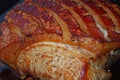 Roast port with crackling on wooden board, ready to eat