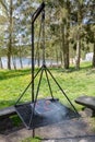 Roast sausage on the grill. Preparing a meal on a camping Royalty Free Stock Photo