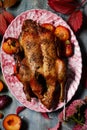 Roast spiced duck with plums