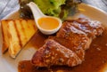 Roast steak with sauce. Royalty Free Stock Photo