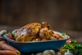 Roast whole turkey or chicken in old pan with vegetables Royalty Free Stock Photo