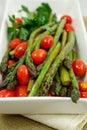 Roasted Asparagus And Cherry Tomatoes Royalty Free Stock Photo