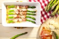 Roasted asparagus with ham and parmesan cheese Royalty Free Stock Photo