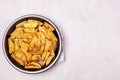 Roasted or Baked Potatoes With Spice in Black Bowl on Light Gray Background Tasty Homemade Dish Dinner Grilled Potatoes Copy Space