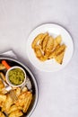 Roasted or Baked Potatoes With Spice in Black Bowl on Light Gray Background Tasty Homemade Dish Dinner Grilled Potatoes Vertical