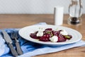 Roasted beet salad with goat cheese and sesame seeds, snack